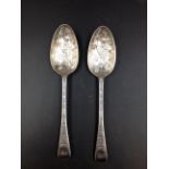 A PAIR OF GEORGIAN SILVER HALLMARKED SPOONS DECORATED WITH BAMBOO, BIRDS AND FOLIAGE DATED LONDON