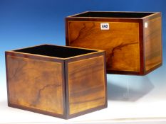 A PAIR OF MAHOGANY BANDED EXOTIC WOOD OPEN TOPPED BOXES, THE INTERIORS PAINTED BLACK. H 20 x W 30