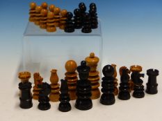 A MAHOGANY BOXED EBONY AND BOX WOOD RING TURNED CHESS SET, THE KINGS. H. 8.5cms.