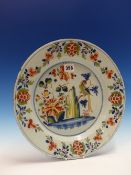 A MID 18th C. ENGLISH DELFT POLYCHROME DISH, POSSIBLY LAMBETH, THE CENTRAL PAINTING OF A PARROT