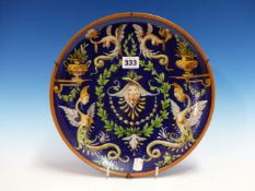 A 19th C. MAIOLICA PLATE PAINTED IN THE CANTAGALLI STYLE WITH GROTESCHI ON A DEEP BLUE GROUND.