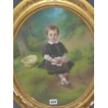 P.JOURDY. (1805-1856) AN OVAL PORTRAIT OF A CHILD HOLING BERRIES, SIGNED PASTEL. 42 x 34cms.