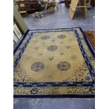 AN ANTIQUE CHINESE CARPET 355 x 280cms.