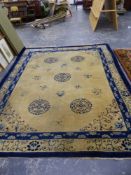 AN ANTIQUE CHINESE CARPET 355 x 280cms.