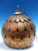 A COPPER FINISHED METAL SINGLE LIGHT GLOBE CEILING FITTING, FIVE ROWS OF PETALS BELOW THE RING