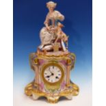 A PARIS PORCELAIN CLOCK CASE SURMOUNTED BY A BISQUE FIGURE OF A FLOWER LADY SEATED FEEDING HER GOAT,