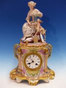 A PARIS PORCELAIN CLOCK CASE SURMOUNTED BY A BISQUE FIGURE OF A FLOWER LADY SEATED FEEDING HER GOAT,