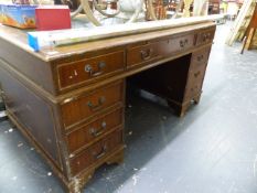 A PEDESTAL DESK.