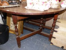 AN OAK GATELEG TABLE.