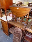 A SMALL DROP LEAF OCCASIONAL TABLE, A TEA TROLLEY AND A CARVED AFRICAN SEAT.