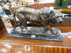 A BRONZE TIGER FIGURE.