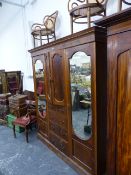 AN EDWARDIAN INLAID MAHOGANY COMPACTUM WARDROBE.