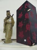 A CHINESE GUANDONG BOXED FIGURE OF A DIGNITARY