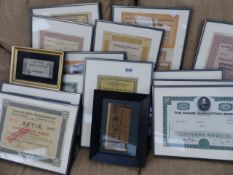 A QTY OF FRAMED SHARE CERTIFICATES,ETC.