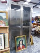 A LARGE BRUSHED STEEL DISPLAY CABINET.