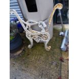 A PAIR OF PAINTED CAST ALUMINIUM BENCH ENDS.