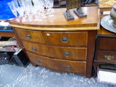 A VICTORIAN BOW FRONT CHEST OF DRAWERS.