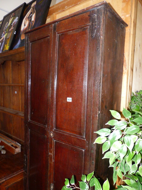 AN 18th.C.AND LATER OAK CABINET.