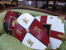 THREE ARMORIAL SHIELDS.