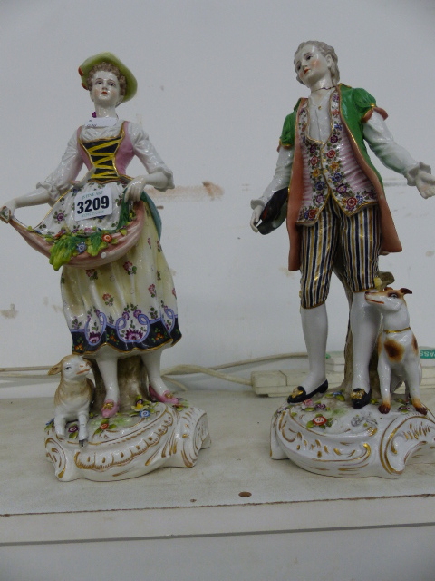 A PAIR OF CAPODIMONTE FIGURES IN 18th.C. DRESS