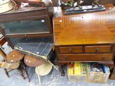 A GLOBE WERNKE TYPE BOOKCASE AND A SMALL MAHOGANY BUREAU.