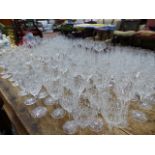 A LARGE SUITE OF CUT CRYSTAL GLASSWARE.