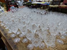 A LARGE SUITE OF CUT CRYSTAL GLASSWARE.