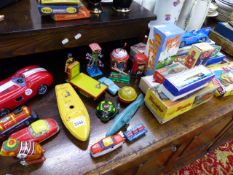 A QTY OF VINTAGE AND OTHER TINPLATE CLOCKWORK VEHICLES,ETC.