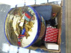 A BOX OF COSTUME JEWELLERY, MILITARY BADGES, ETC.