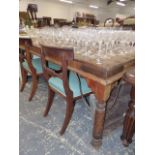 A EASTERN HARDWOOD DINING TABLE.