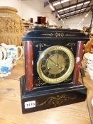 A VICTORIAN SLATE MANTLE CLOCK.