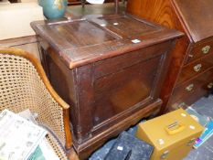 AN 18th.C.AND LATER OAK PANEL COFFER ON STAND.