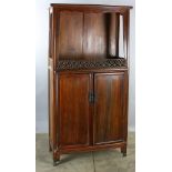 Chinese Qing Dynasty huanghuali cabinet, 71" x 14" x 35".