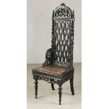 19th century carved rosewood high back chair, 56" h x 21 1/2" w x 18" d. Provenance: from a