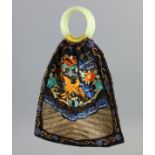 Chinese Qing Dynasty embroidered handbag with carved jade handle.
