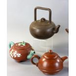 Nine Chinese Jixing pottery teapots with lids, some with glazed decoration, approximately 6 1/2" H x