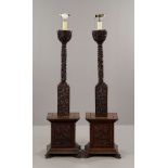 Pair of Chinese Imperial Peking Palace rosewood torchieres, 19th century, converted into lamps,