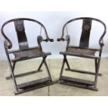 Pair of Chinese hardwood armchairs, 40" x 26" x 22".
