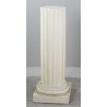 Fluted design composition pedestal, 40 1/2" H x 15 1/2" square (at base). Provenance: West Palm