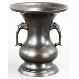 Japanese bronze urn, signed on base, 11" H x 10 1/2" diameter. Provenance: From a Palm Springs,