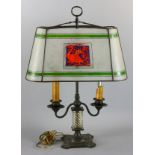 Handel table lamp, has one broken panel, 27" H x 18 1/2" W x 9 1/2" D. Provenance: West Palm