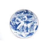 The dish is decorated in the interior with a scene of the Eight Daoist Immortals gathering under a