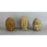 Group of three (3) Chinese stone heads, 9" H x 8 1/2" diameter. Provenance: West Palm Beach, Florida
