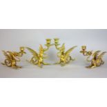 Two pairs of figural dragon brass candlesticks, late 19th/early 20th century, possibly Chinese,