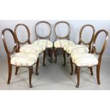 Set of six (6) walnut hoop-back side chairs with upholstered seats, 36" H x 18 1/2" W x 17 1/2" D.