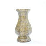 The vase has a charmingly potted shape, the gently flaring sides elegantly rising from a