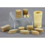 Collection of Asian engraved mother-of-pearl gaming chips, along with a carved bone dice cup, cup 3"
