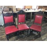Lot of three Victorian carved oak chairs, 49"h.