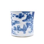 The cylindrical pot raised in waisted form covered by various tones of cobalt blue, depicting