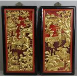 Pair of Chinese carved wooden plaques, 36" x 18".